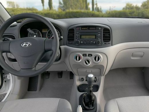 Рамка переходная с карманом Metra Kia Rio 2006-2010